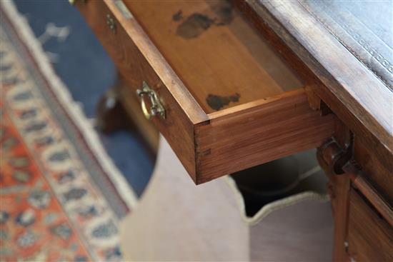 Attributed to Gillows. A Victorian gothic revival rosewood pedestal desk, W.4ft 8in. D.2ft 2in. H.2ft 5.5in.